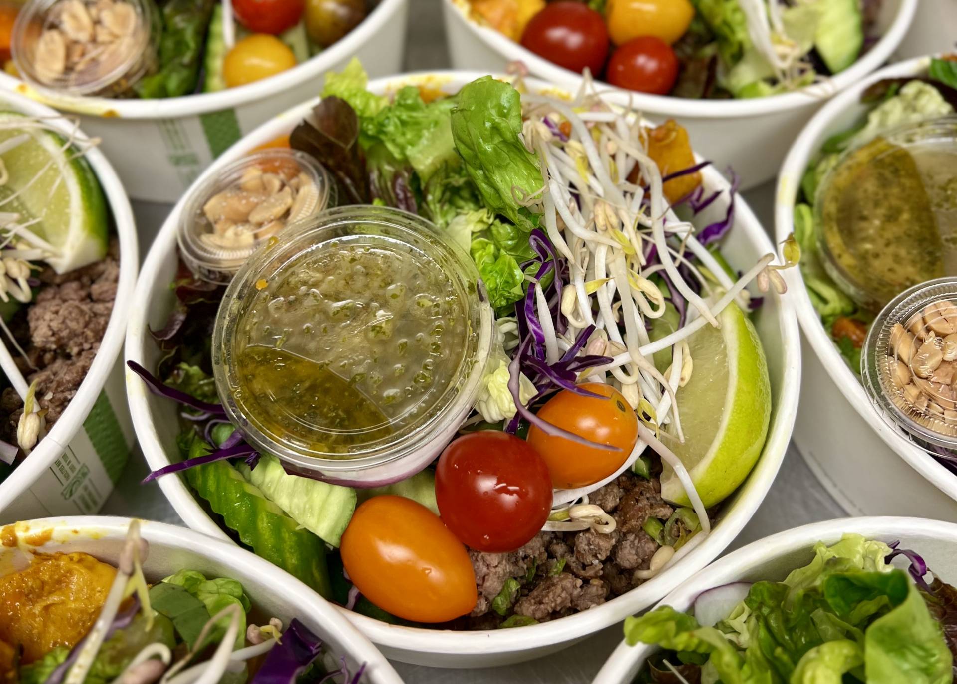 Thai Inspired Beef Salad with Lime, Mint & Cucumber Medley, served with Local Organic Greens